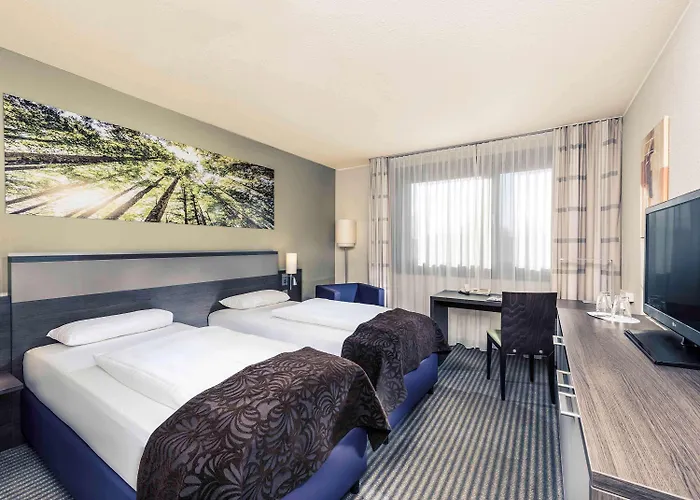 Отель Mercure Duesseldorf Airport 4*